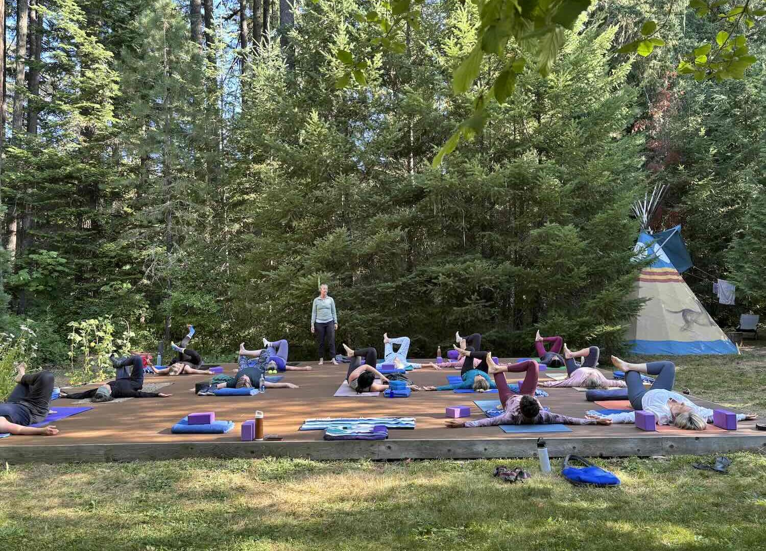 creekside yoga in the forest at a women's yoga retreat in Oregon